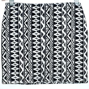Black and white tribal print bodycon mini skirt. Size S.